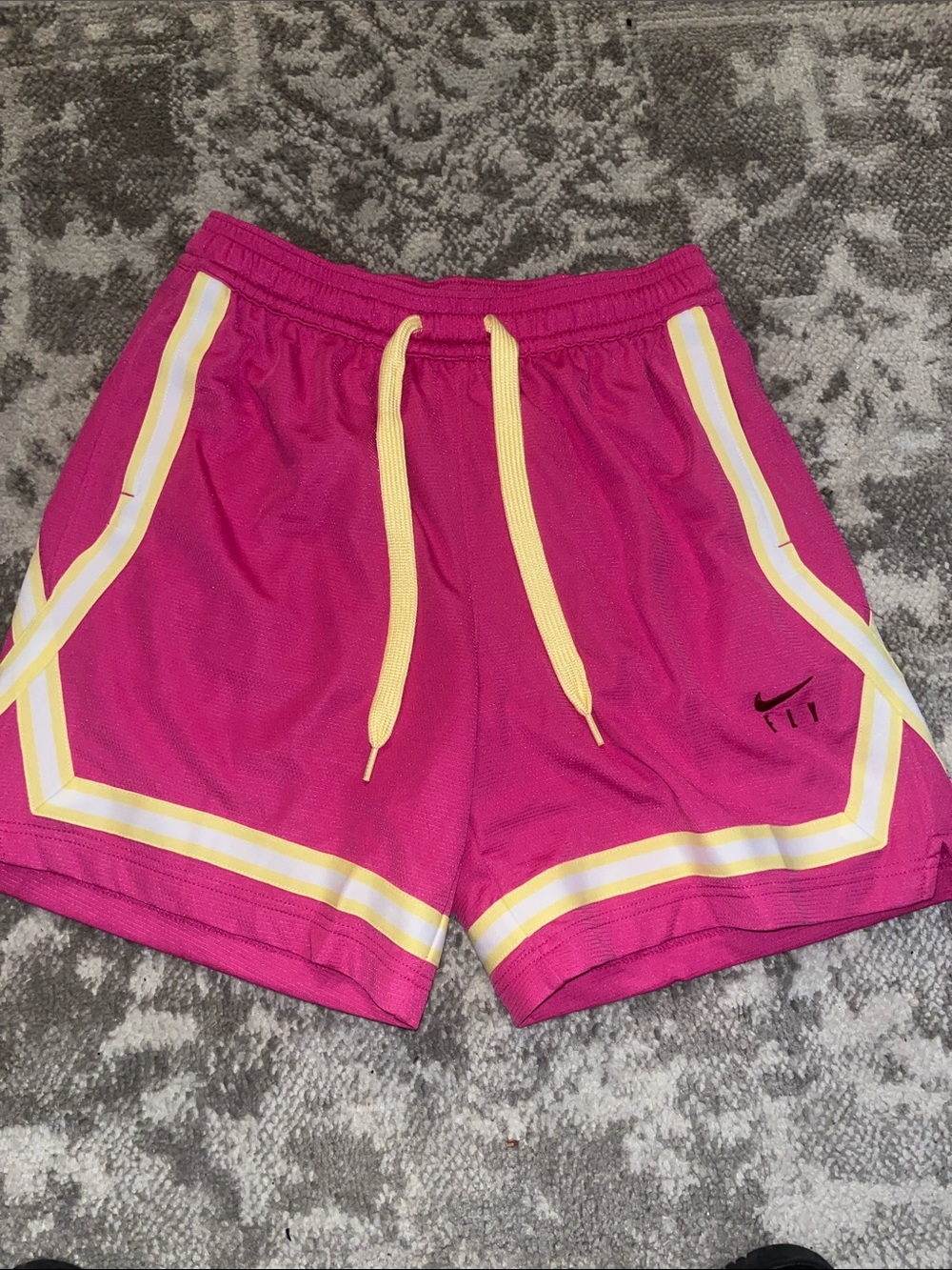 Nike Women’s Magenta Athletic Shorts with Yellow Accents